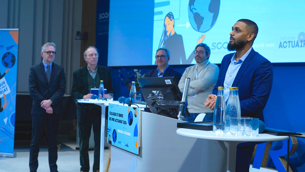 Second slide - SCOR Life at SCOR Careers blog post on SCOR Foundation for Science image with Eric LeCoeur, Philipe Trainar, Arnaud Cohen, Stéphane Loisel and then the other winner Nicxan Hensman Stalin