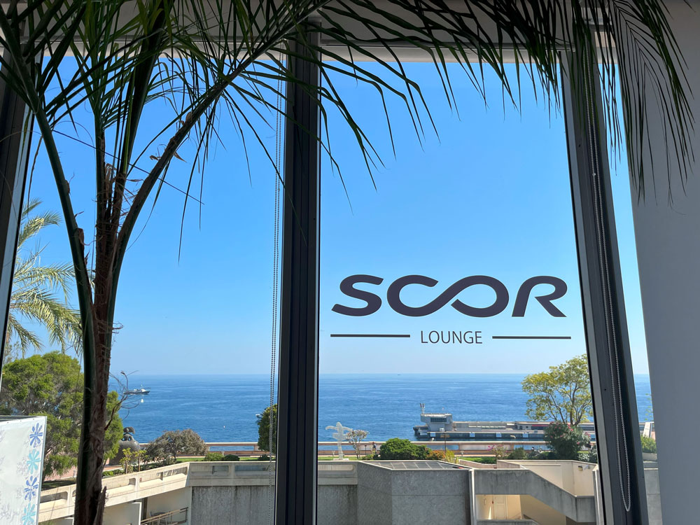 Photo of a window with a SCOR Lounge sticker at the Rendez-Vous de Septembre 2024 event