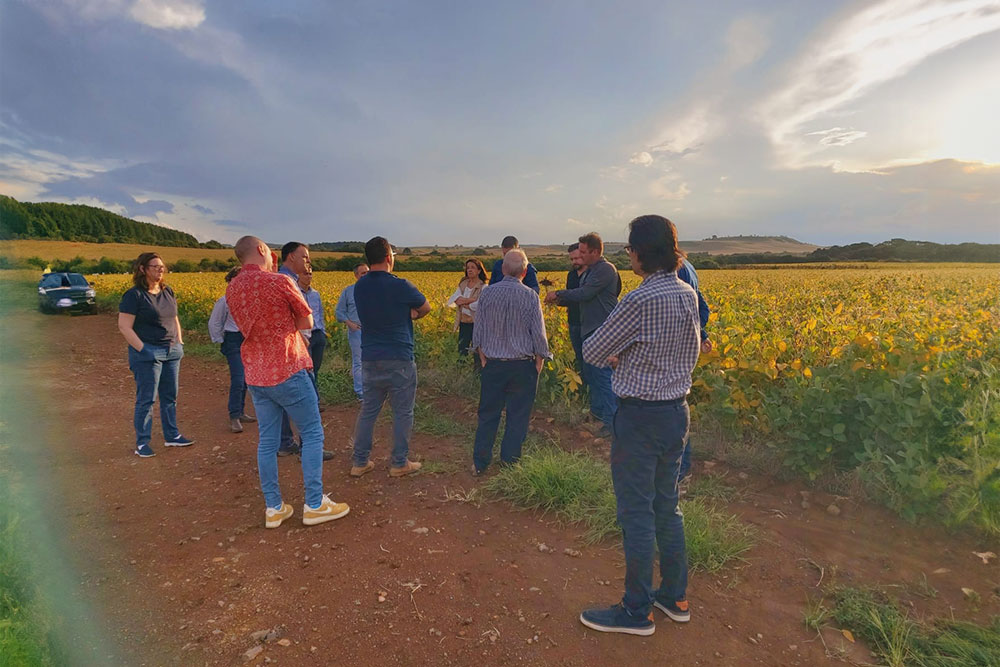 Eric Jenck visiting an agriculture field in Brazil with ESSOR colleagues