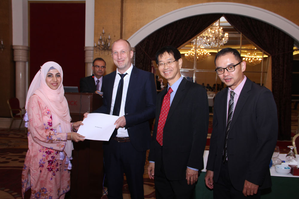 Eric Jenck providing technical training in Pakistan with SCOR Singapore colleagues