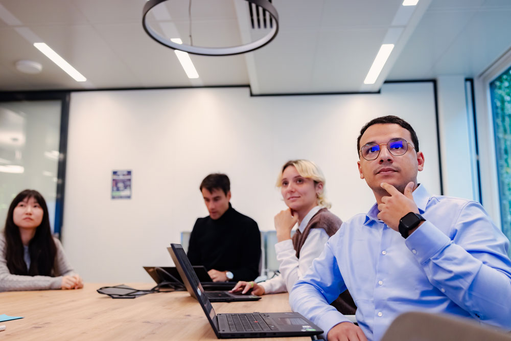 SCOR employees in a data business meeting, following a project presentation illustrating innovation and analytical expertise