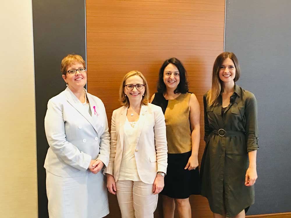 Paula speaking at an event