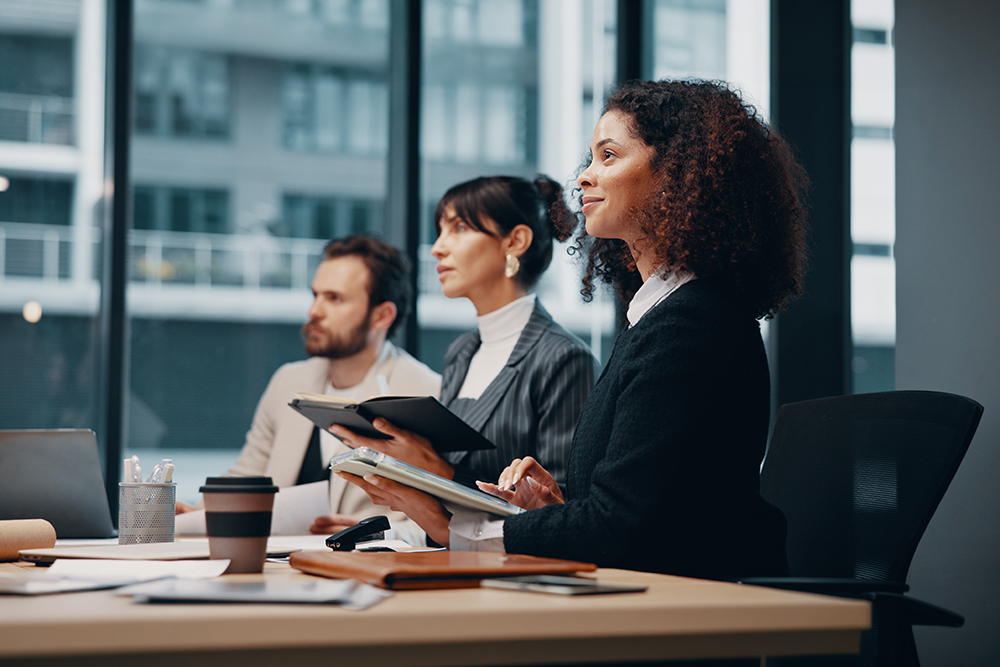 Group, employees or staff with documents for company proposition, presentation or pitch together in boardroom.