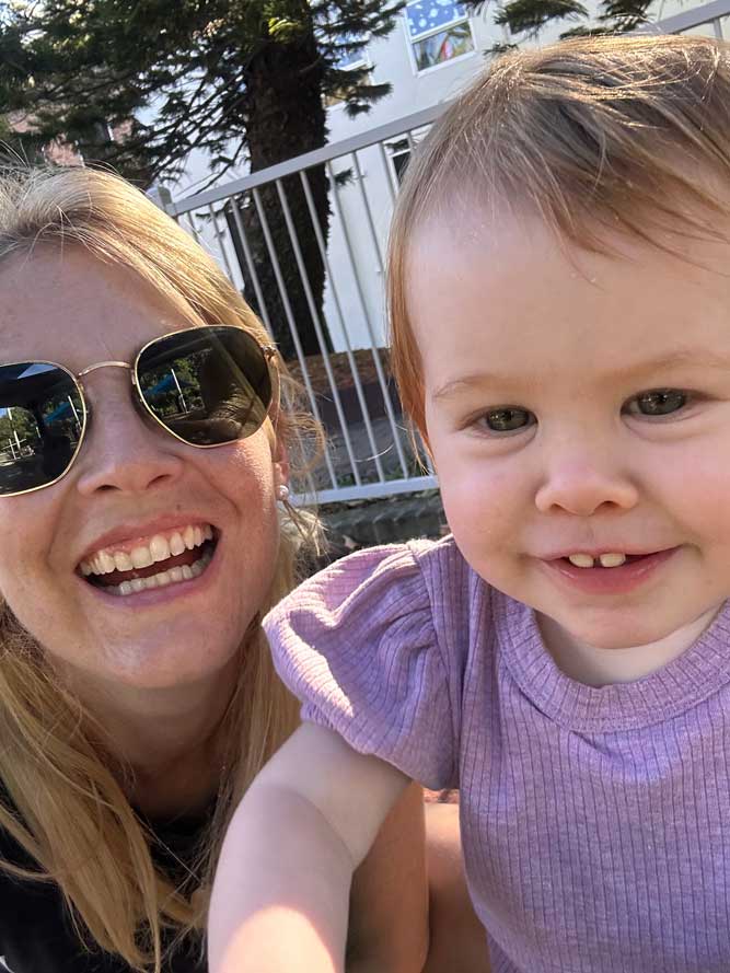 Chrystelle Martin with her daughther outside