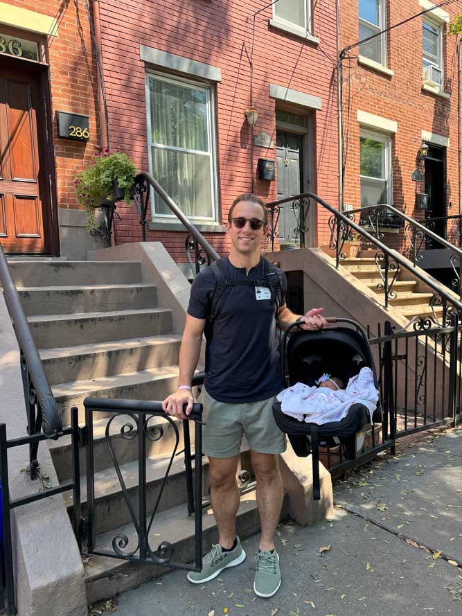 Mark Sissons with his daughter outside