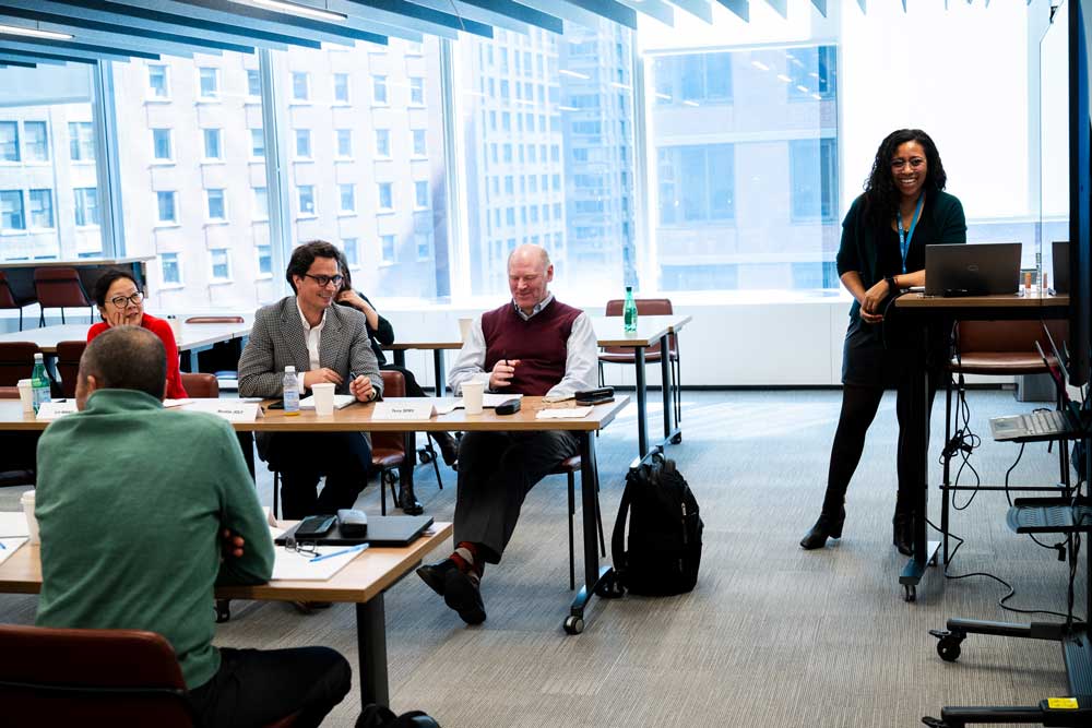 SCOR Voices Career Compass image with Emeline and a group the Expert training in the New York office