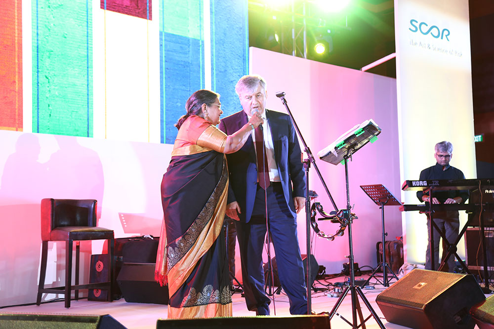 Indian singer Usha Uthup and former SCOR P&C CEO Victor Peignet, SCOR India