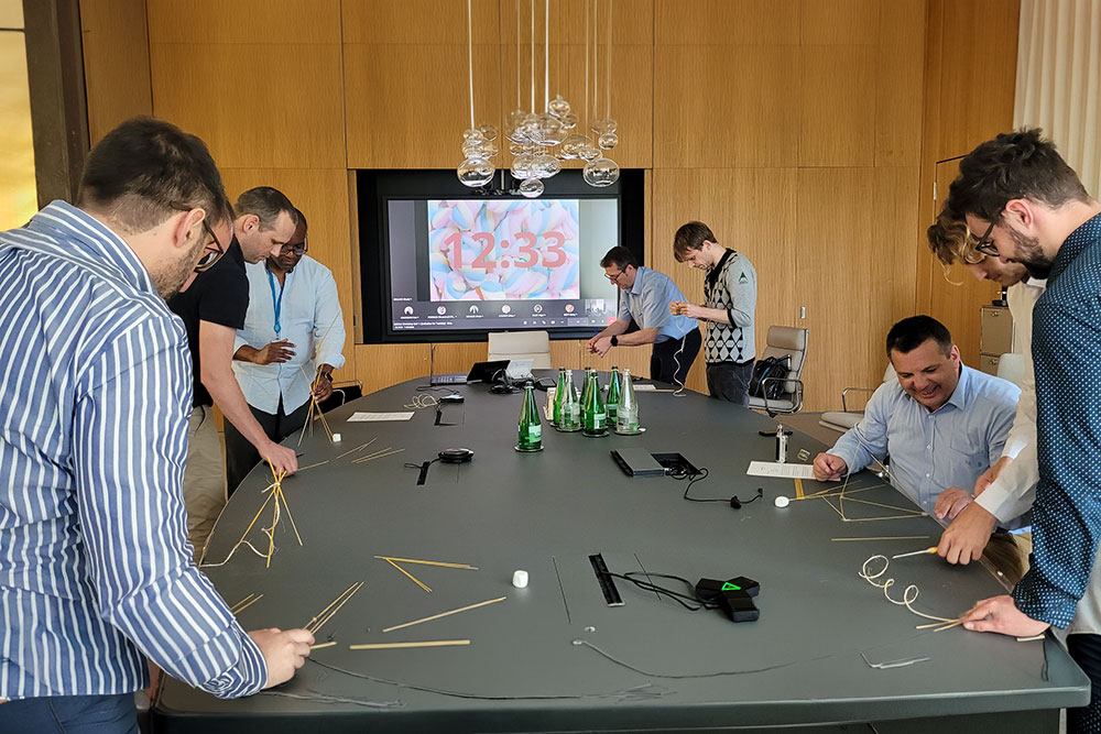Ghada Bouaziz and team doing a Marshmallow Challenge, SCOR Zurich