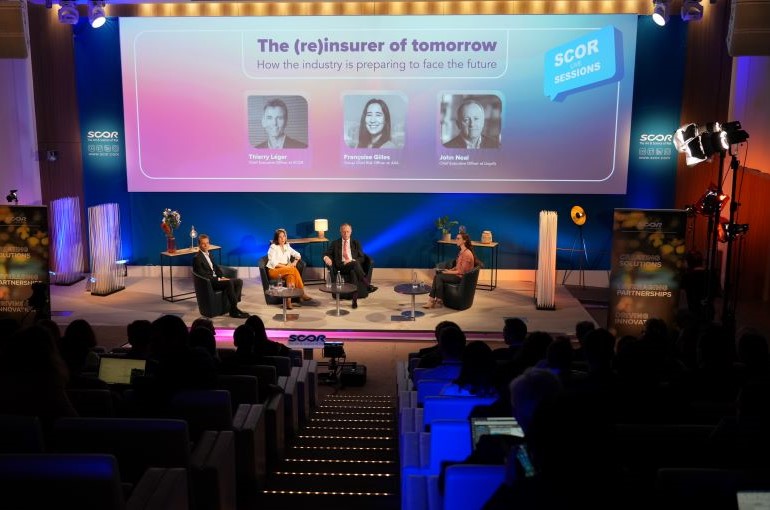 Intervenants sur scène pendant l'évènement SCOR Live: The (Re)Insurer of Tomorrow en octobre 2024