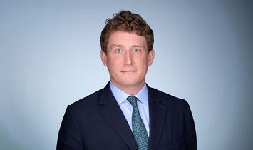 Headshot of Oliver Posgaten, Head of International Political and Credit Risk at SCOR P&C