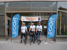May 2025 Life at SCOR Careers Blog post teaser with the SCOR Champions on their bike