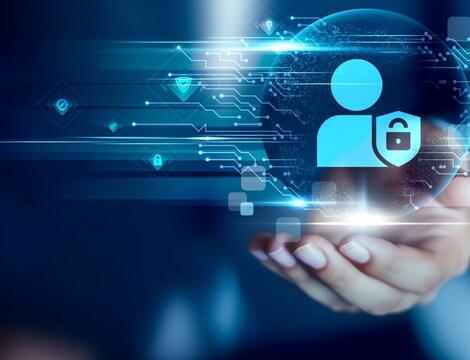 Hand holding privacy icon against a blue background
