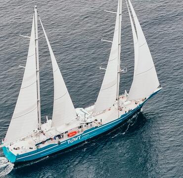 TOWT sailing cargo ship on the open sea