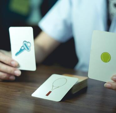 A nurse holds up memory cards