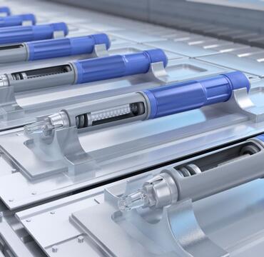 Autoinjector pens on production line