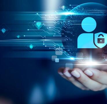 Hand holding privacy icon against a blue background