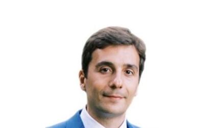 Headshot of Julien Mattei of SCOR