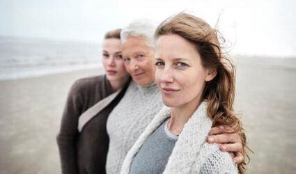 3 generation of women on a beach