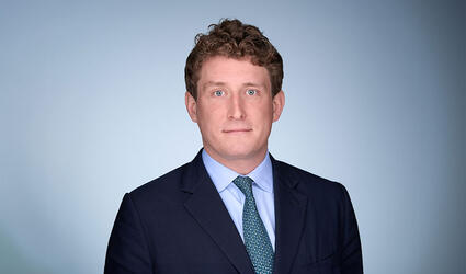 Headshot of Oliver Posgaten, Head of International Political and Credit Risk at SCOR P&C