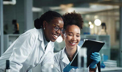 SCOR Careers Blog post header image about women in science with women, scientist and tablet with research, laboratory and digital study for healthcare science