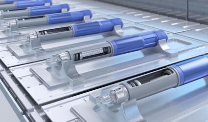 Autoinjector pens on production line