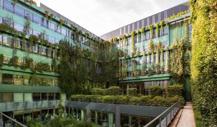 Interior courtyard at SCOR's Paris headquarters with vegetation